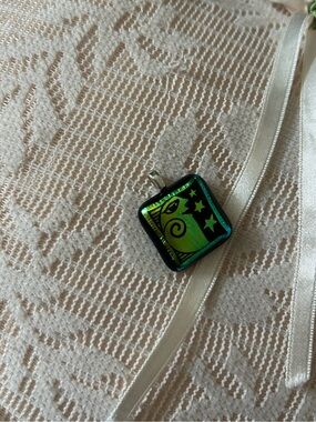 hand-etched dichroic glass and unique metal jewelry